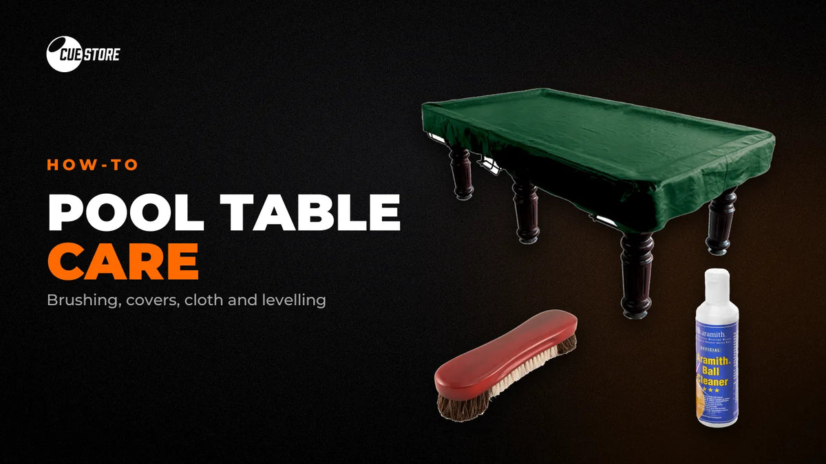 Pool table maintenance: a covered table, a horse hair table brush and Aramith ball cleaner